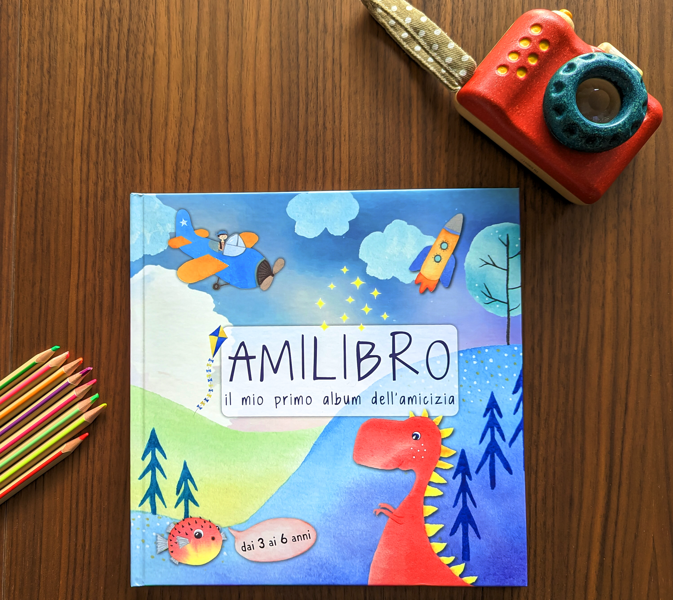 Copertina rigida di Amilibro, design dinosauro